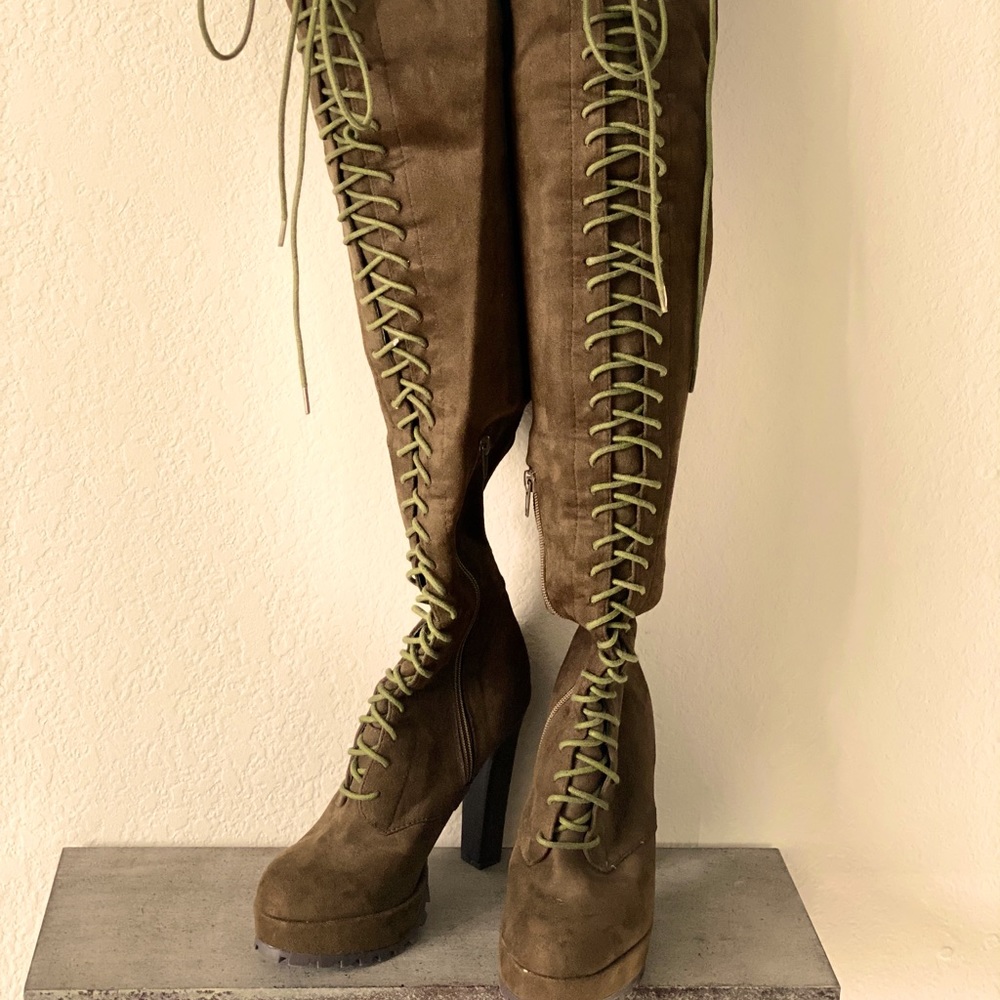 I am selling these above knee heeled boots!!